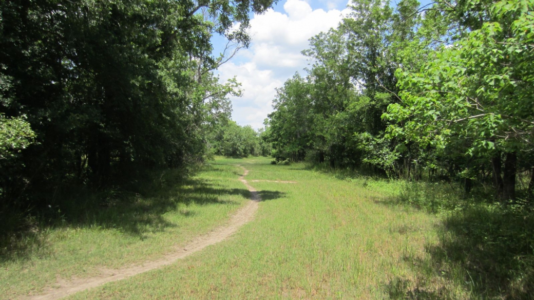 A vélo sur le Noble Road Trail, à George Bush Park, Houston.